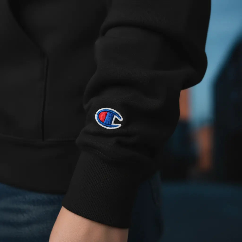 Close-up detail - Champion C logo on left cuff